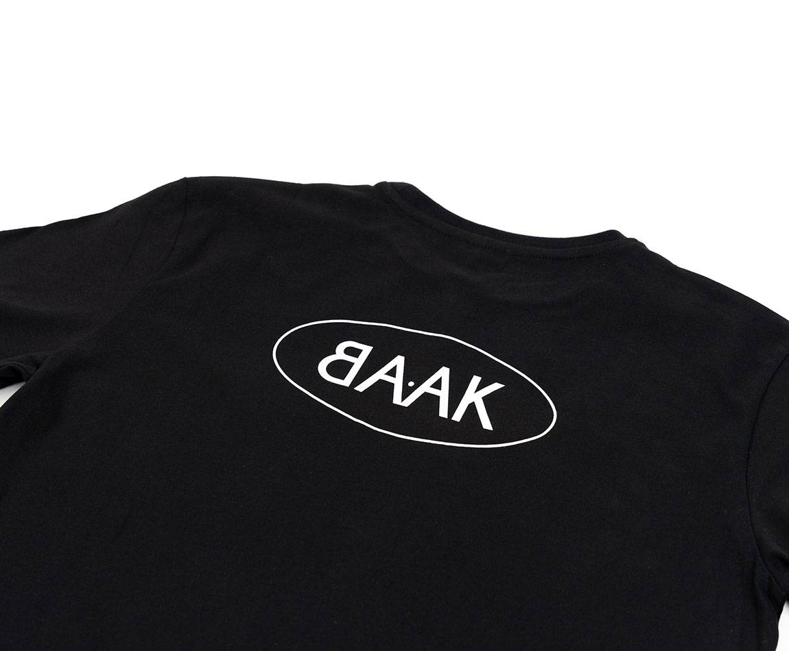 Black T-Shirt - Short sleeves - Heart pocket on front - Screen-printed white BAAK logo on back Black T-Shirt - Short sleeves - Heart pocket on front - Screen-printed white BAAK logo on back