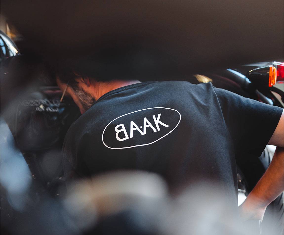 Black T-Shirt - Short sleeves - Heart pocket on front - Screen-printed white BAAK logo on back Black T-Shirt - Short sleeves - Heart pocket on front - Screen-printed white BAAK logo on back
