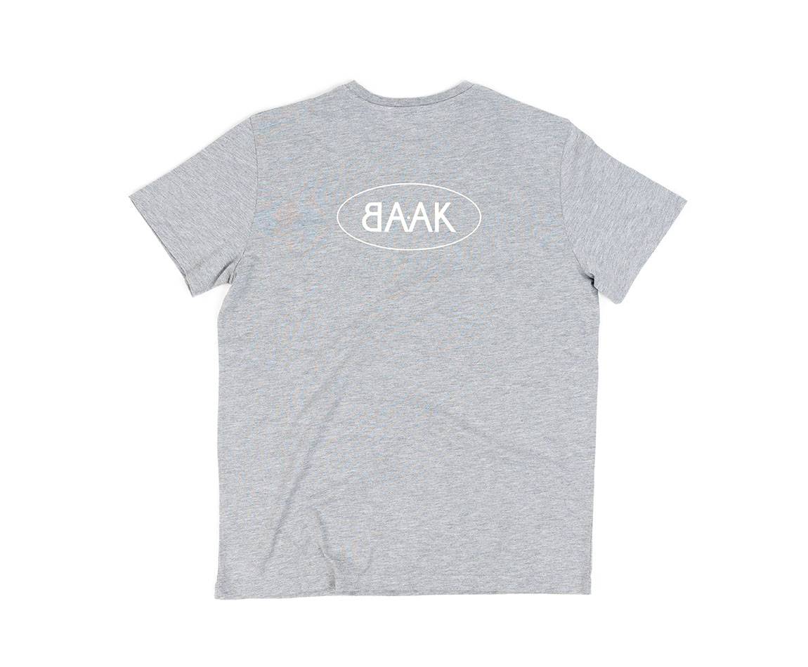 Grey T-Shirt - Short sleeves - Heart pocket on front - Screen-printed cream BAAK logo on back Grey T-Shirt - Short sleeves - Heart pocket on front - Screen-printed cream BAAK logo on back