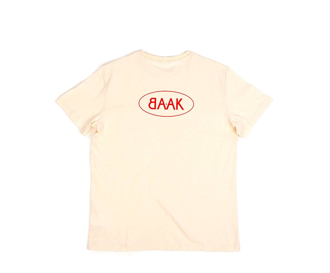 Cream T-Shirt - Short sleeves - Heart pocket on front - Screen-printed red BAAK logo on back Cream T-Shirt - Short sleeves - Heart pocket on front - Screen-printed red BAAK logo on back