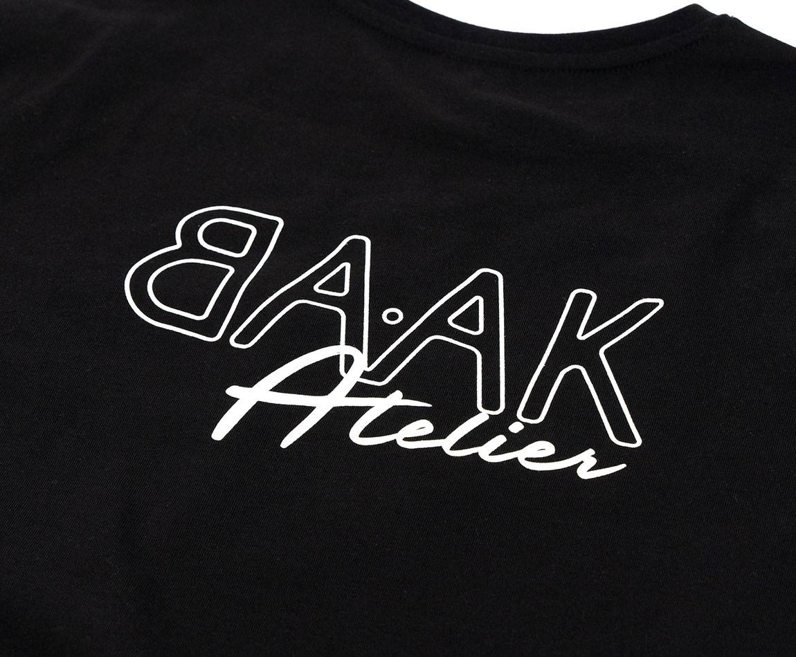 Black T-Shirt - Short sleeves - Heart pocket on front - White "BAAK Atelier" silk-screen print on back Black T-Shirt - Short sleeves - Heart pocket on front - White "BAAK Atelier" silk-screen print on back