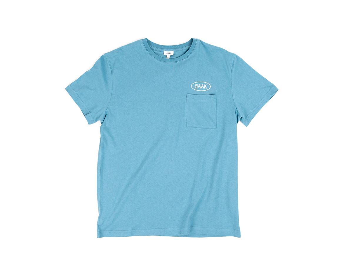 Blue T-Shirt - Short sleeves - Heart pocket on front - Screen-printed cream BAAK logo above pocket Blue T-Shirt - Short sleeves - Heart pocket on front - Screen-printed cream BAAK logo above pocket