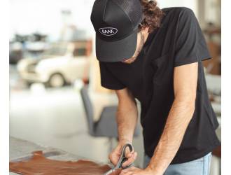 Black Trucker cap - White BAAK logo on front - one size fits all