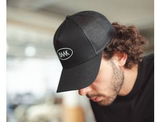 Black Trucker cap - White BAAK logo on front - one size fits all