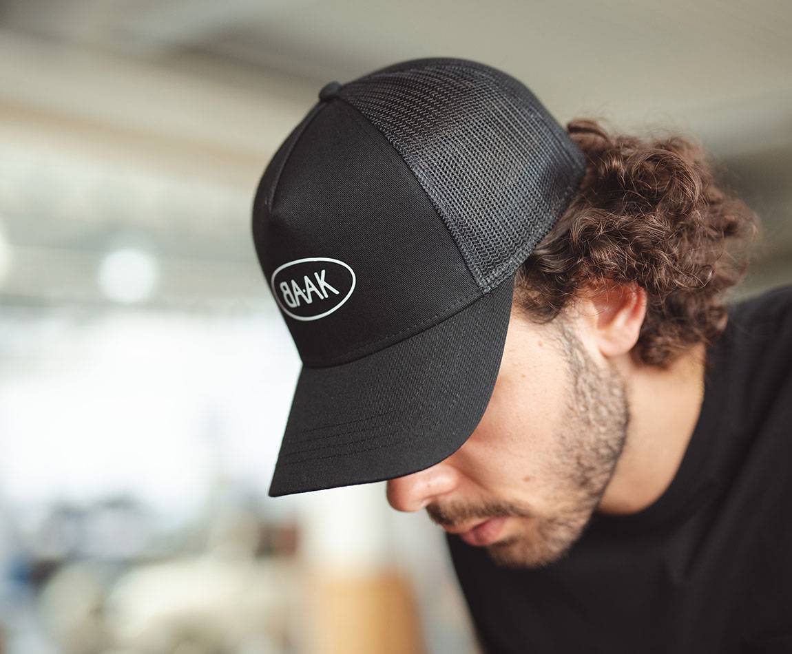 Black Trucker cap - White BAAK logo on front - one size fits all Black Trucker cap - White BAAK logo on front - one size fits all