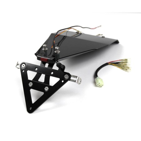 Universal wheel arch/plate holder, rear position and turn signal holder